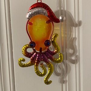 Colorful large 8” octopus ornament with Santa hat